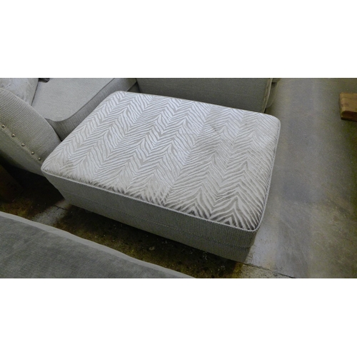 1541 - A Coco Frost upholstered and studded four seater sofa and armchair with footstool (original RRP £180... 