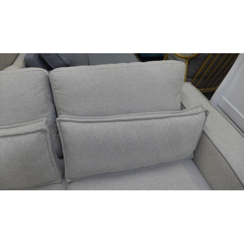 1589 - A grey upholstered three seater sofa