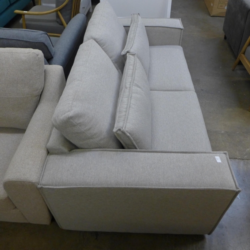 1589 - A grey upholstered three seater sofa