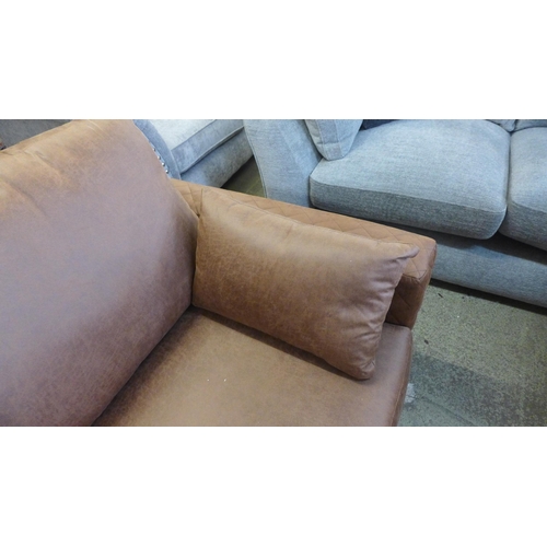 1597 - A dark tan upholstered corner sofa