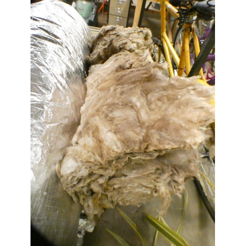 2141 - A roll of  metallic loft insulation and a roll of loft fibre wool