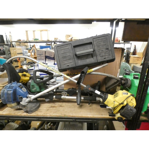 2145 - 4 Petrol-driven strimmers - for spares or repair with plastic tool box