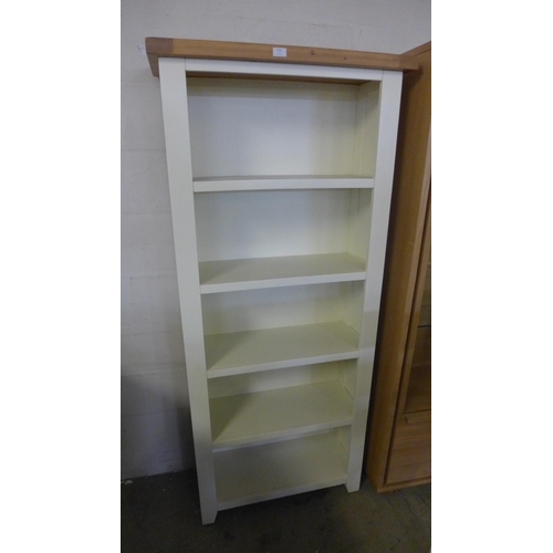 1708 - A Hampshire white painted and oak tall bookcase *This Lot is Subject to VAT*