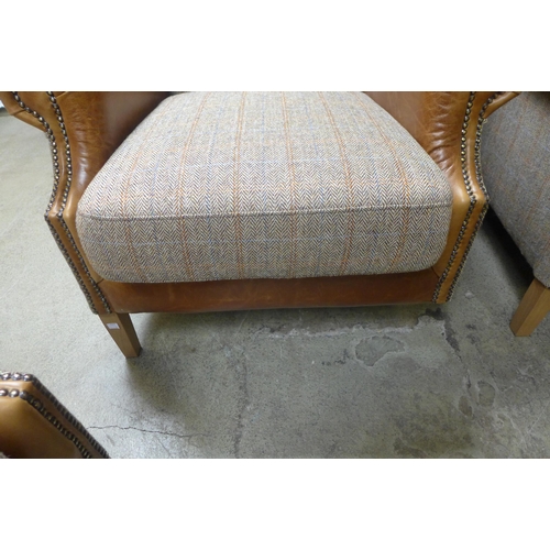 1668 - A Fast Track Kew hunting lodge Harris tweed and Cerato leather armchair *missing leg*