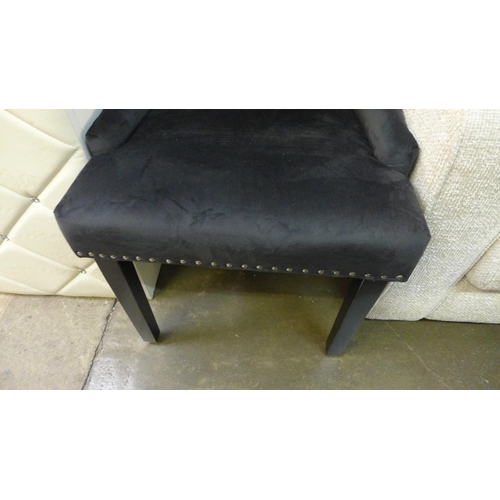 1488 - A pair of black velvet studded side chairs * this lot is subject to VAT