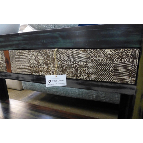 1555 - A Wolf Möbel hardwood rustic style console table with patterned drawers * this lot is subject to VAT