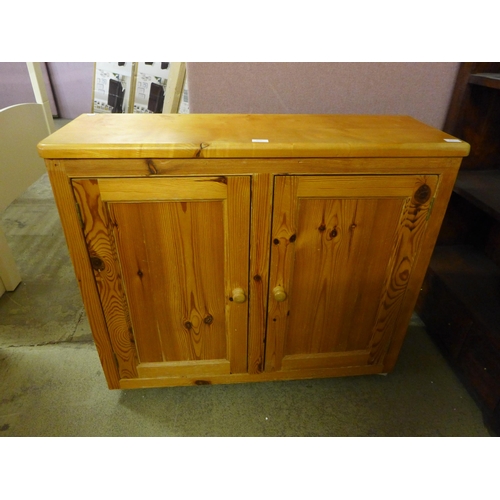 1635 - A pine two door sideboard