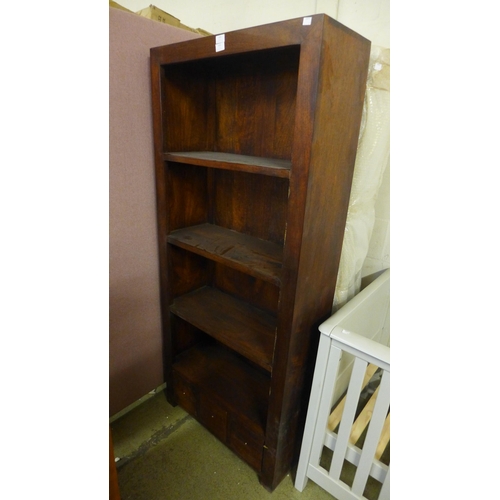 1652 - An Indian hardwood three drawer bookcase * this lot is subject to VAT