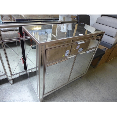 1662 - A mirrored sideboard, a large sideboard, a console table and a silver framed mirror, all damaged * t... 