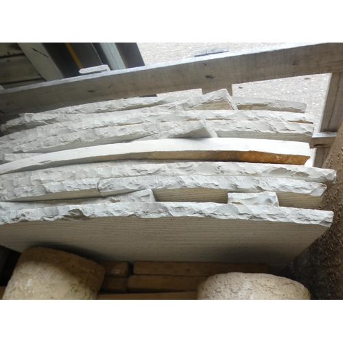 2397 - A pallet of unused garden stone items including lime end stones, slabs, 5 coping stones, gatepost to... 