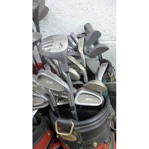 2284 - 5 Bags of various golf woods/irons inc. Howson, Inesis, Dunlop, Adams, etc.