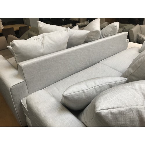 1560 - A Chatsworth-flex straw silver upholstered three and four seater sofas