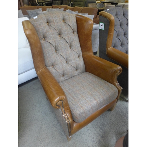 1364 - A Fast Track Kew hunting lodge Harris tweed and Cerato leather armchair damage left hand side front