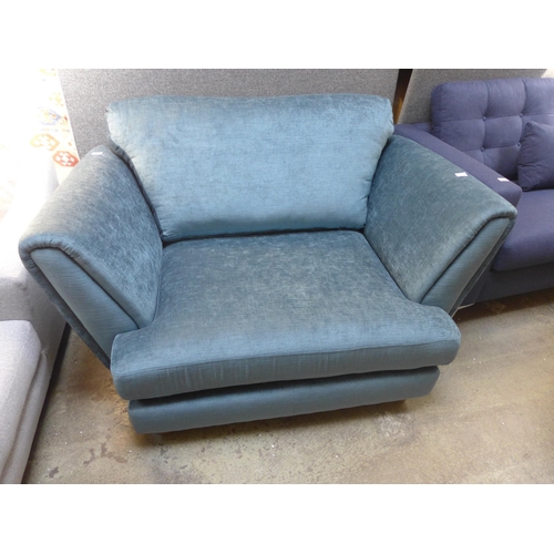 1378 - A teal velvet upholstered loveseat