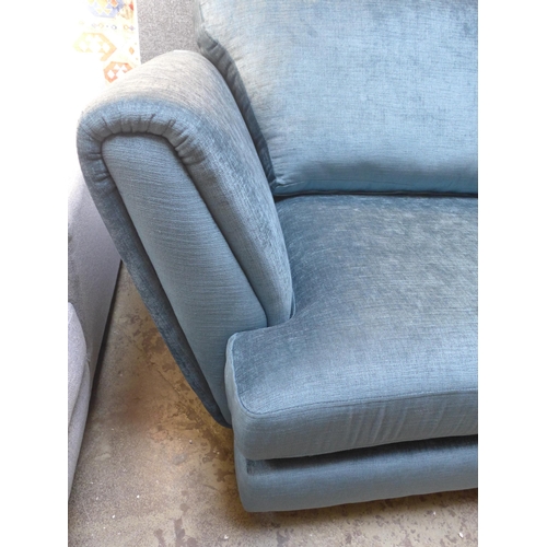 1378 - A teal velvet upholstered loveseat