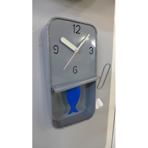 1446 - A grey metal sardine tin wall clock, H 30cms (HKL1110)   #