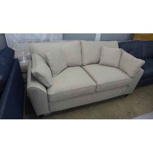 1485 - An Idaho Rubin natural fabric two and three seater sofas