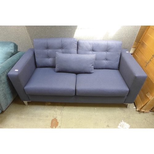 1407 - A blue upholstered two seater sofa