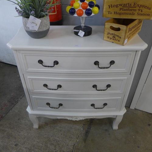 1432 - A white three drawer chest