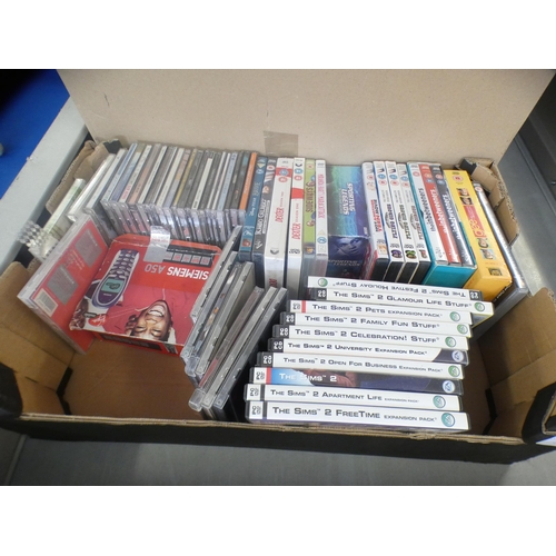 2106 - Box of approx. 40 DVDs & PC games with box of lamps & 3 pairs of unused curtains