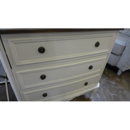 1490 - A three drawer chest with contrasting top