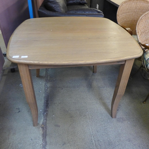 1648 - A washed oak square dining table