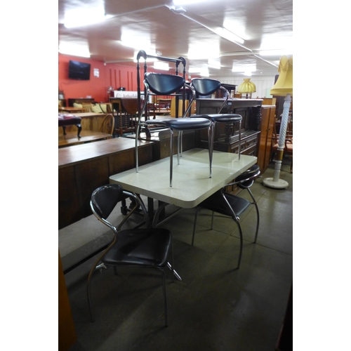 156 - A chrome and Formica topped kitchen table and four chairs