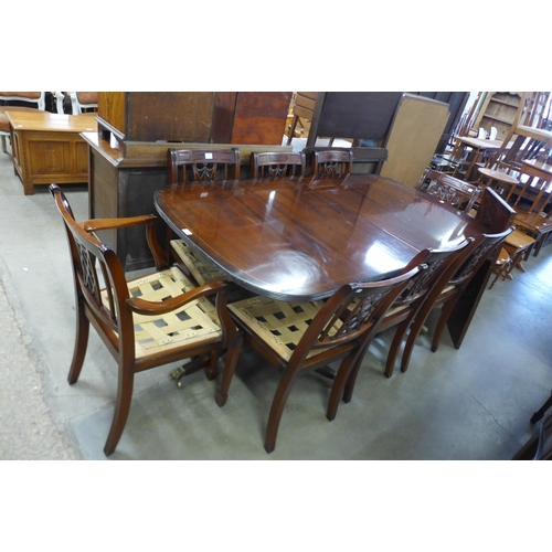 163 - A Regency style mahogany ten piece dining suite