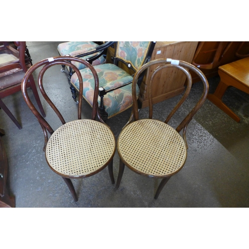 176 - A pair of beech bentwood chairs