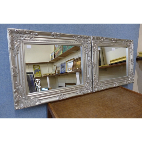 283 - A pair of silver effect framed mirrors