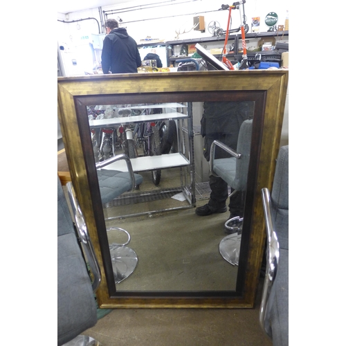 2307 - Two grey fabric padded bar stools and an ornate 1m x 80cm mantle mirror