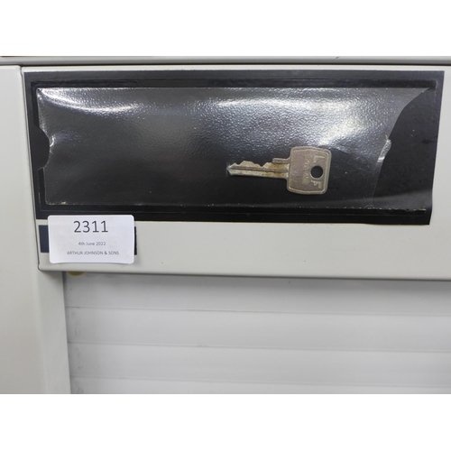 2311 - A 160cm tall Vickers metal cabinet with roller shutter door, and key