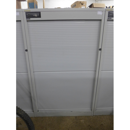 2313 - A 160cm tall Vickers metal cabinet with roller shutter door, with key