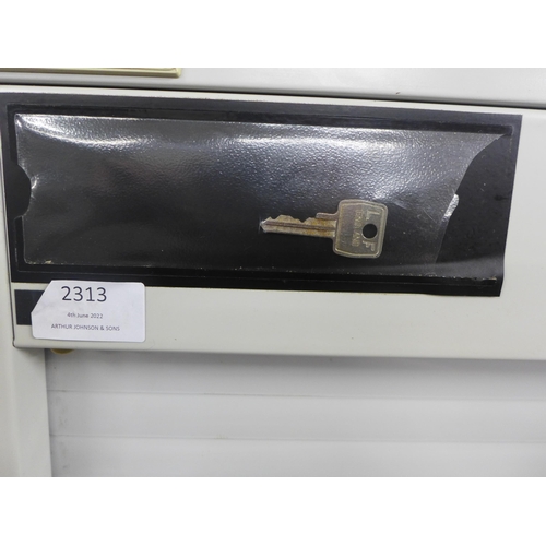 2313 - A 160cm tall Vickers metal cabinet with roller shutter door, with key