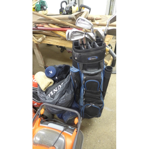 2330 - 6 Bags of golf clubs including 9 Wilson irons,  Dunlop part set, etc.