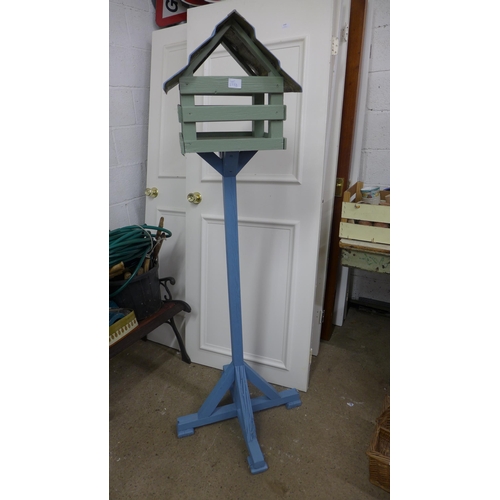 2338 - Painted wood bird table on 5ft stand