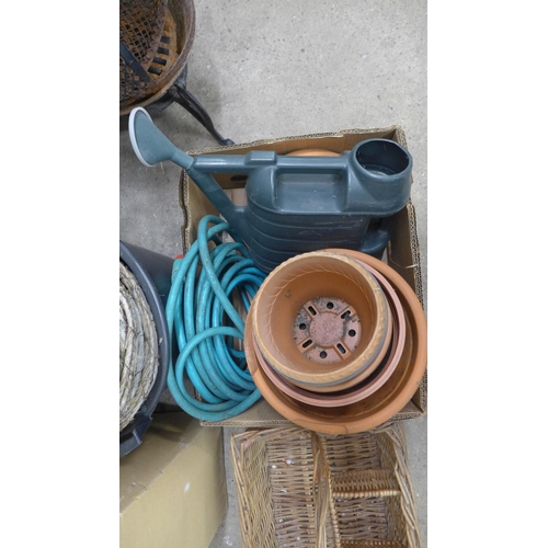 2343 - Approx. 50 plastic plant pots and wicker baskets