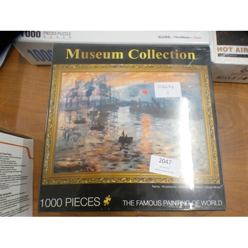 2046 - 3 Sealed 1000-piece jigsaws (German stone castle, Paris street scene and London Impressionist scene)