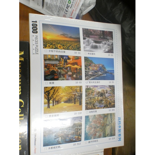 2046 - 3 Sealed 1000-piece jigsaws (German stone castle, Paris street scene and London Impressionist scene)