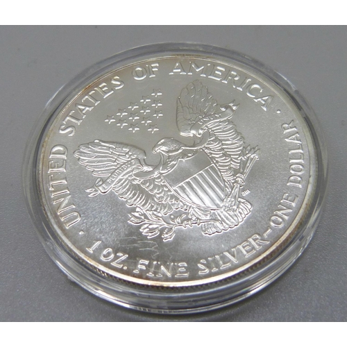 1038 - A USA 1oz fine silver one dollar coin, 1990