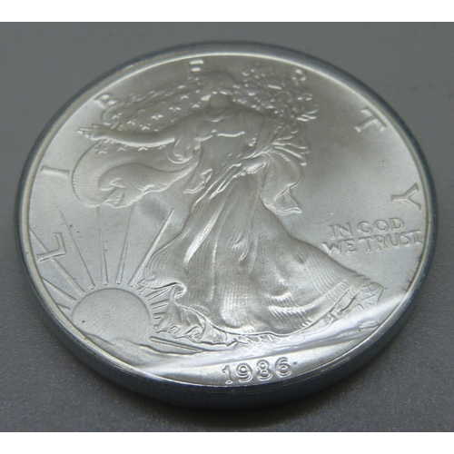 1041 - A USA 1oz fine silver one dollar coin, 1986