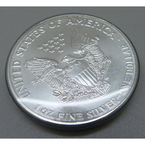 1041 - A USA 1oz fine silver one dollar coin, 1986