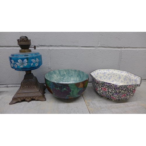 1058 - A S. Hancock & Son fruit bowl, chip to rim, a Royal Doulton fruit bowl and an oil lamp base with blu... 