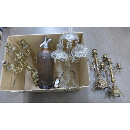 1067 - Three metal candelabra and one glass and a soda syphon converted into a lamp **PLEASE NOTE THIS LOT ... 