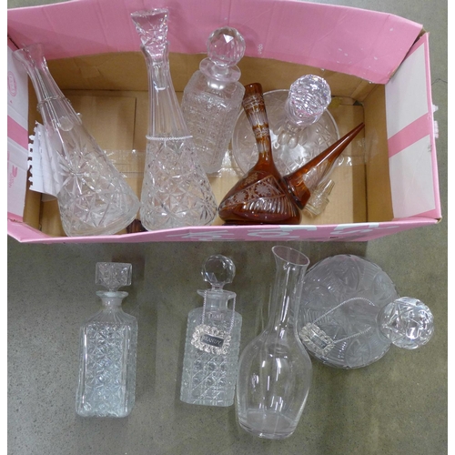 1073 - A collection of glass decanters, some with labels **PLEASE NOTE THIS LOT IS NOT ELIGIBLE FOR POSTING... 