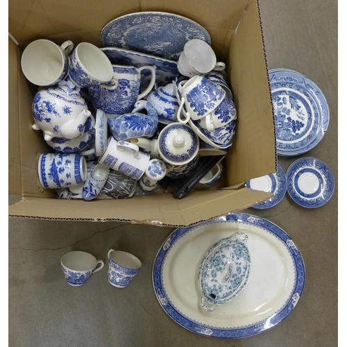 1084 - A box of blue and white china including cups, bowls, saucers and a large meat plate **PLEASE NOTE TH... 