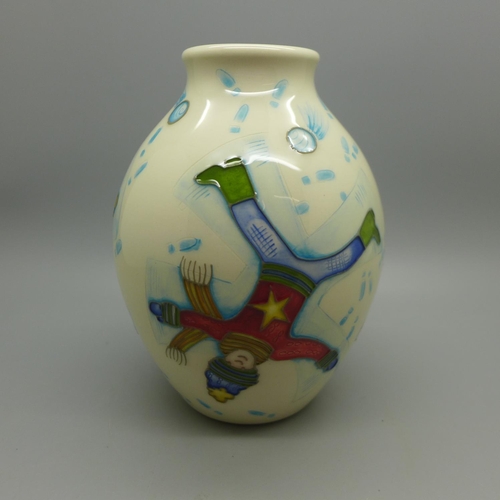 611 - A Moorcroft vase, Snow Angel by Helen Dale, 13cm