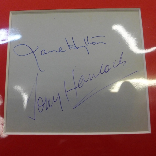 615 - A mounted autograph display; Tony Hancock and Jane Hylton