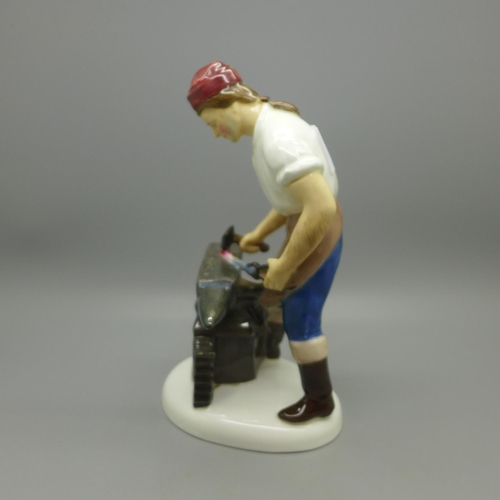 618 - A Royal Doulton figure, The Blacksmith of Williamsburg, HN2240