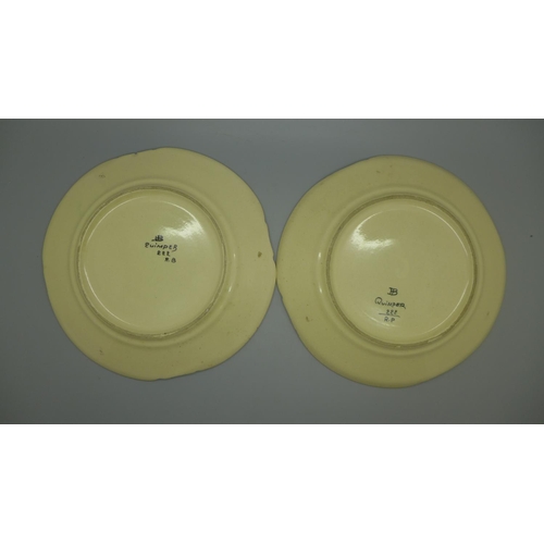 630 - A pair of early 20th Century HB Quimper portrait plates, 222 R P backstamp, one with small chips to ... 